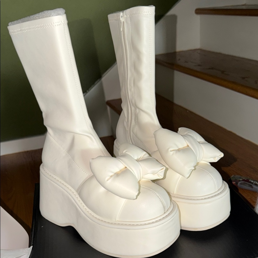 Sugar Thrillz Cream Platform Knee-High Boots with Bow